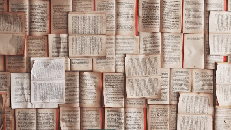 Stack of Bibles and books representing global Bible translation efforts