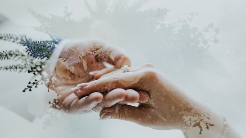 Hands folded in prayer for unreached people groups around the world